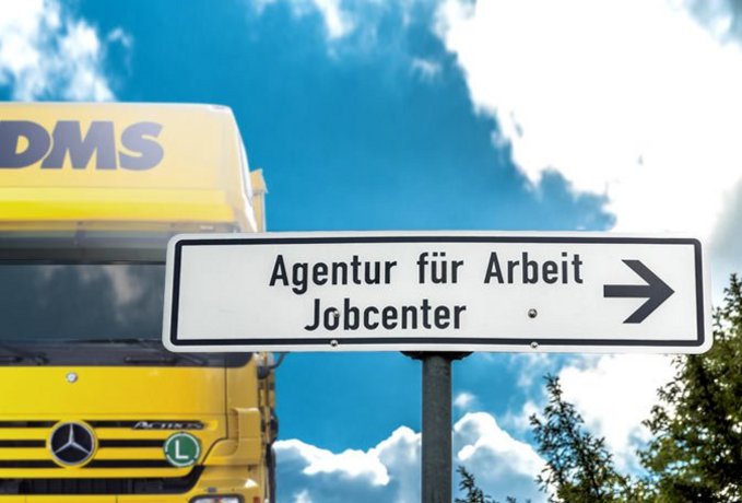 LKW vor Schild "Jobcenter"