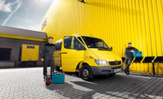 Team Handwerker vor Sprinter-Transporter Team Handwerker vor Sprinter-Transporter